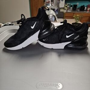 Nike Black and White Sneakers with Sleek Silhouette